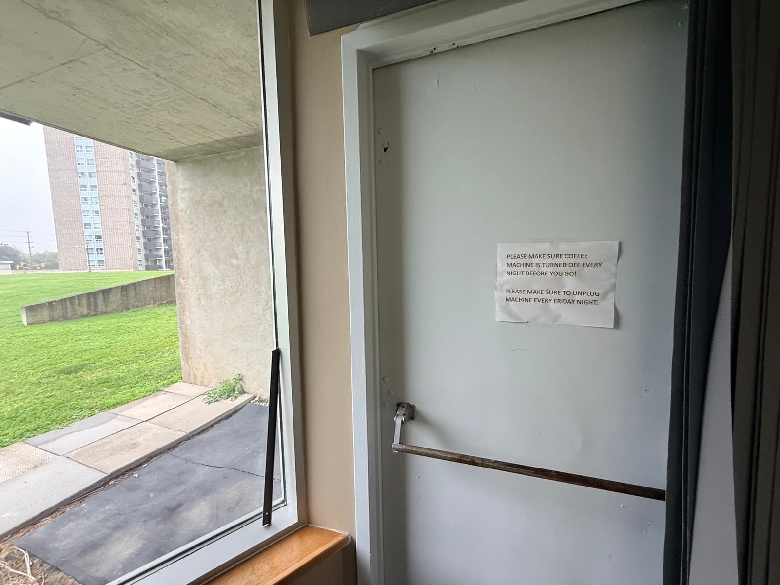 Door leading directly to the fenced outdoor play lawn